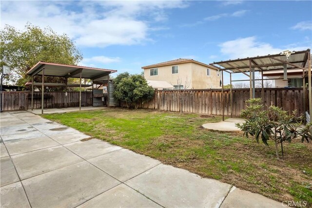 view of yard featuring a carport