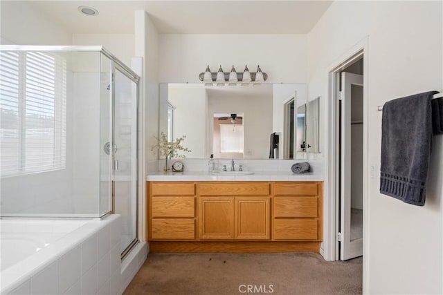 bathroom with vanity and plus walk in shower