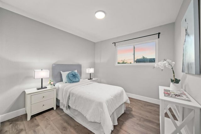 bedroom featuring hardwood / wood-style flooring