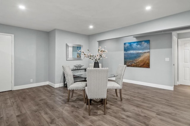 dining area featuring dark hardwood / wood-style flooring