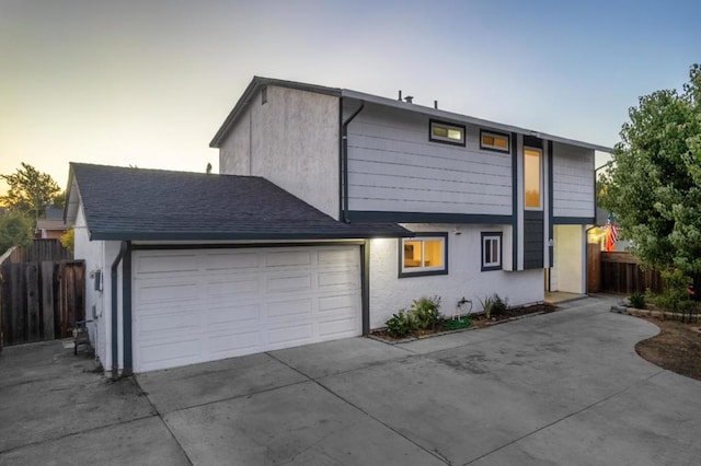 view of front of property featuring a garage