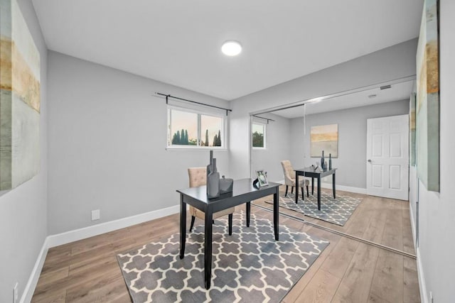 office area with hardwood / wood-style floors