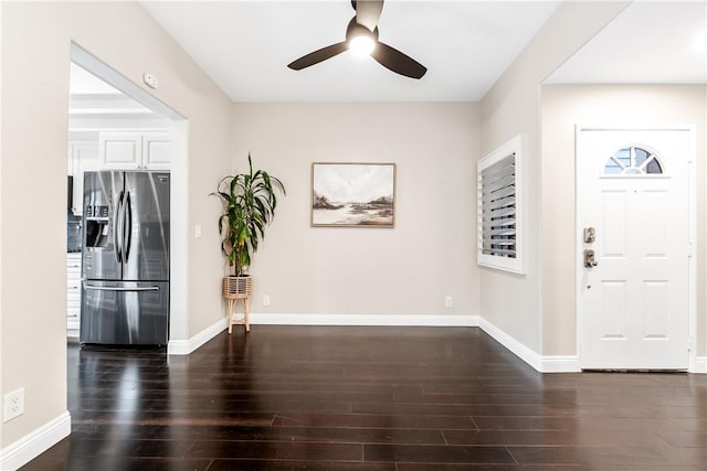 entryway featuring ceiling fan and dark hardwood / wood-style floors