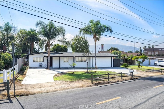 ranch-style home with a garage