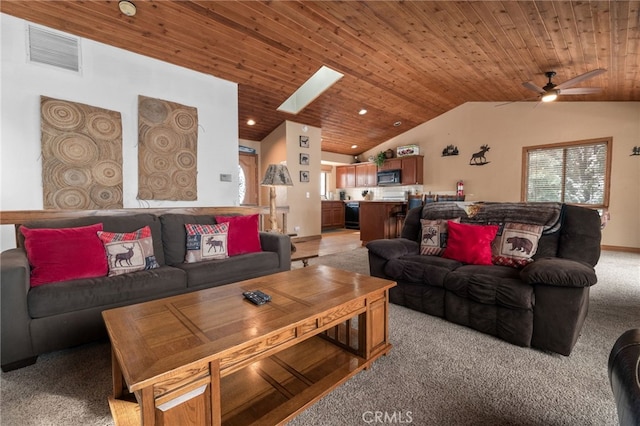 living room with ceiling fan, wooden ceiling, light carpet, and vaulted ceiling