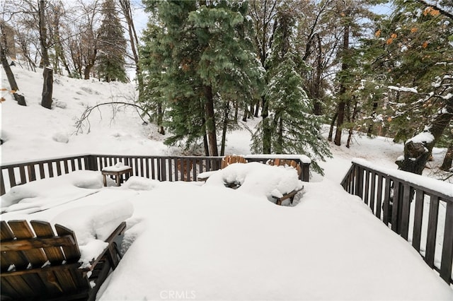 view of snow covered deck