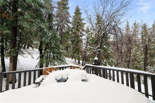 view of snow covered deck