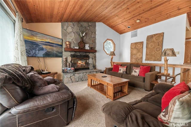 living room featuring wood ceiling, carpet, a stone fireplace, and vaulted ceiling