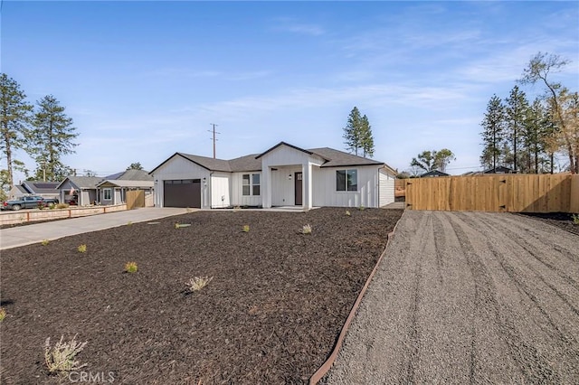 single story home with a garage