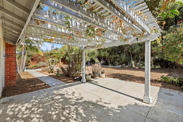 view of patio featuring a pergola