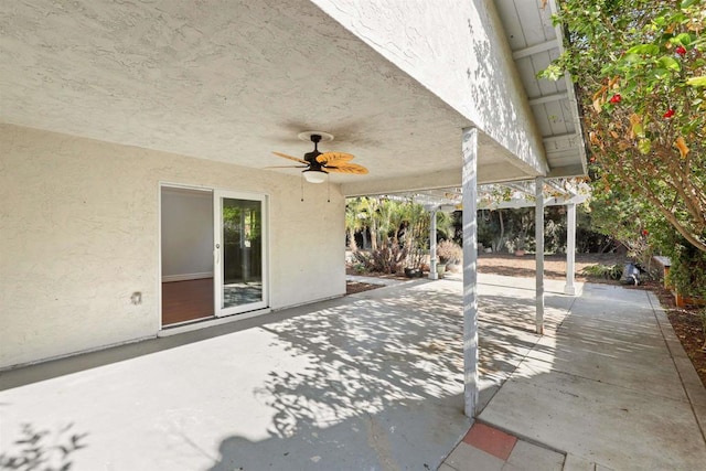 view of patio / terrace featuring ceiling fan