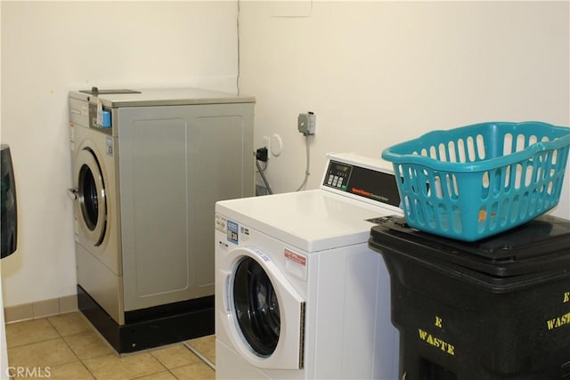 6405 Green Valley Cir Unit 209, Culver City, CA 90230 - laundry area featuring separate washer and dryer and light tile patterned flooring