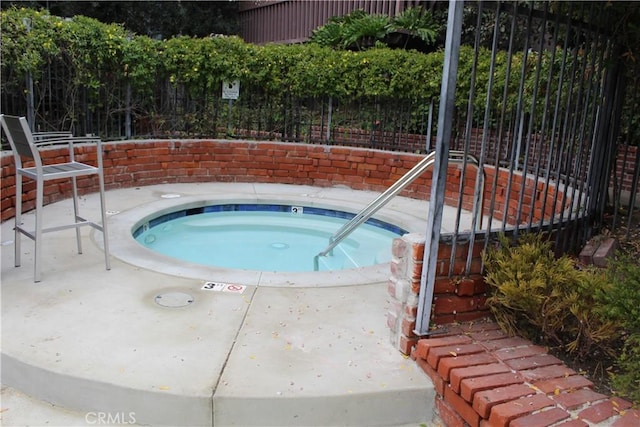 6405 Green Valley Cir Unit 209, Culver City, CA 90230 - view of pool featuring fence and a hot tub