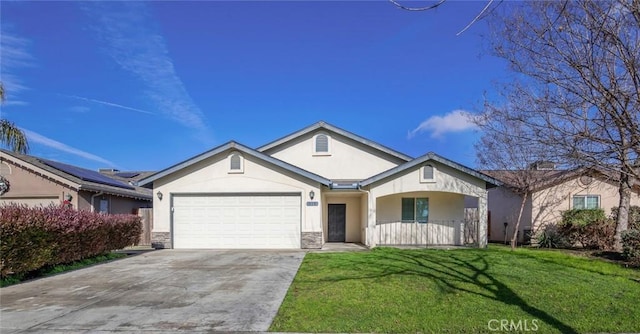 single story home featuring covered porch, a front lawn, and a garage