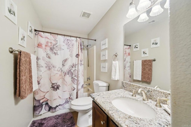 full bathroom with toilet, vanity, and shower / bath combo with shower curtain