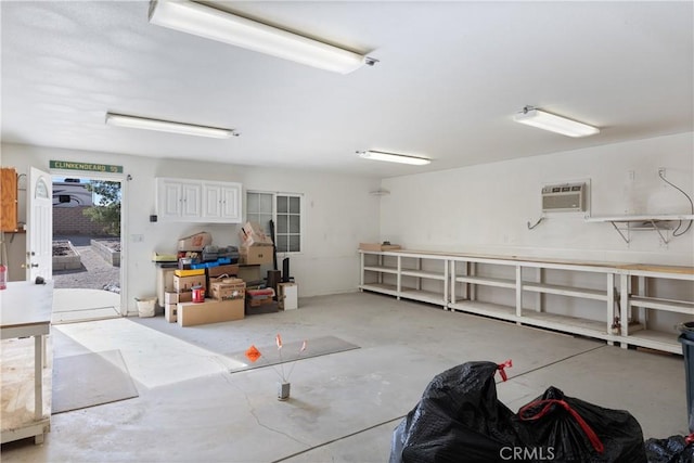 garage with an AC wall unit