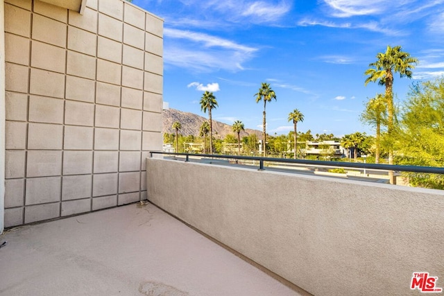 balcony featuring a mountain view