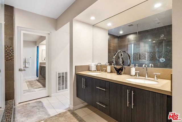 bathroom featuring vanity and tile patterned floors