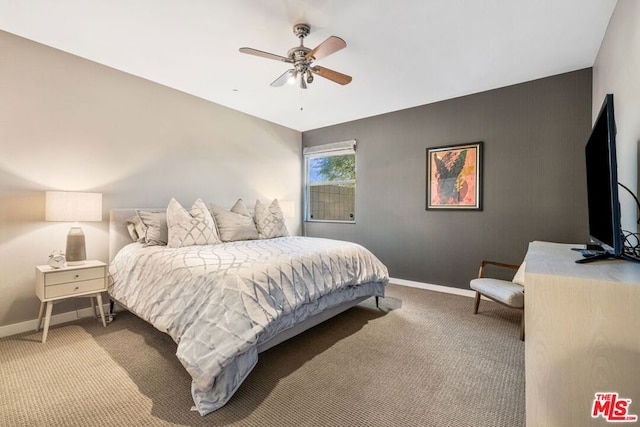 bedroom featuring ceiling fan and carpet flooring