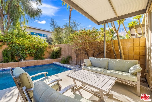 view of pool with outdoor lounge area