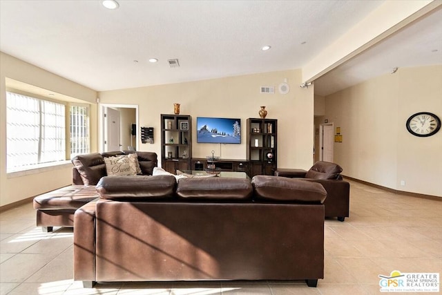 tiled living room featuring vaulted ceiling