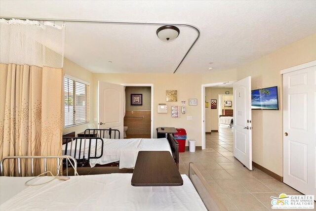 dining area with light tile patterned flooring