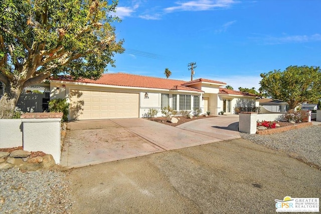 ranch-style home featuring a garage