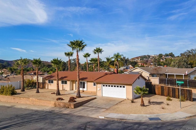 single story home with a garage