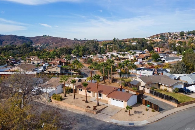 drone / aerial view featuring a mountain view