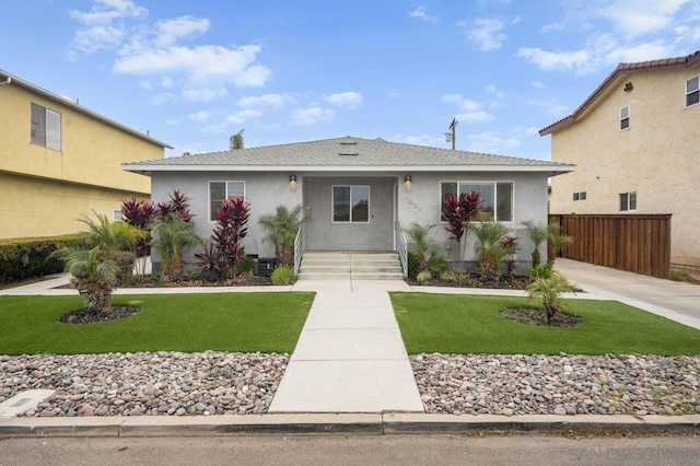 view of front of home with a front lawn