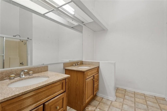 bathroom with vanity and walk in shower