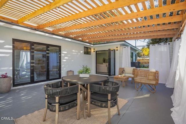 view of patio with outdoor dining area, fence, and a pergola