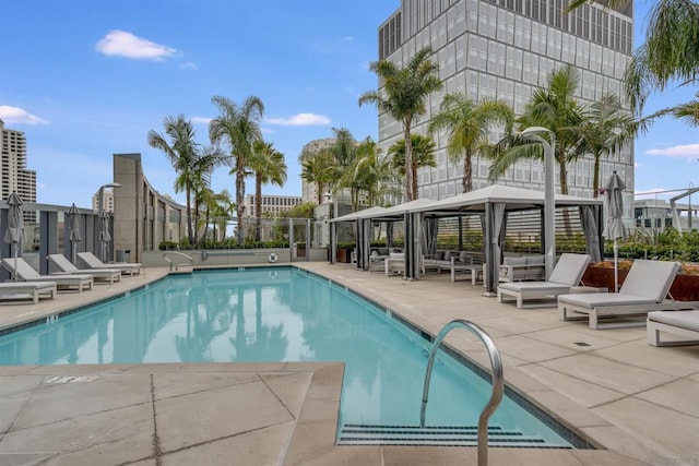 view of swimming pool featuring a gazebo and a patio area