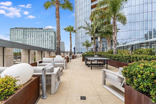 surrounding community featuring a patio area