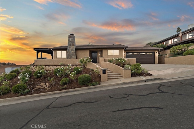 view of front of home with a garage