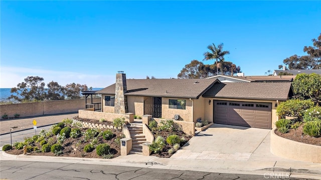 single story home with a garage