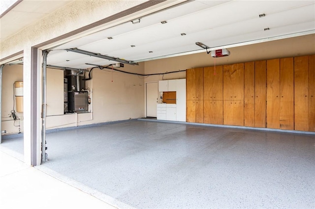 garage with heating unit and a garage door opener