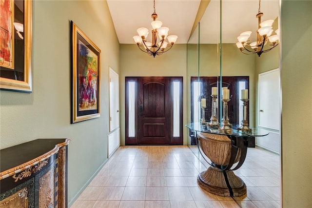 foyer with light tile patterned flooring and an inviting chandelier