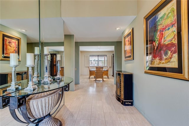 hallway featuring light tile patterned floors