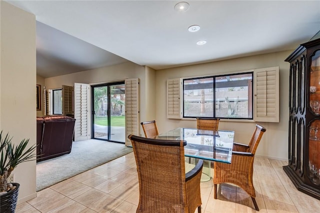 view of carpeted dining space