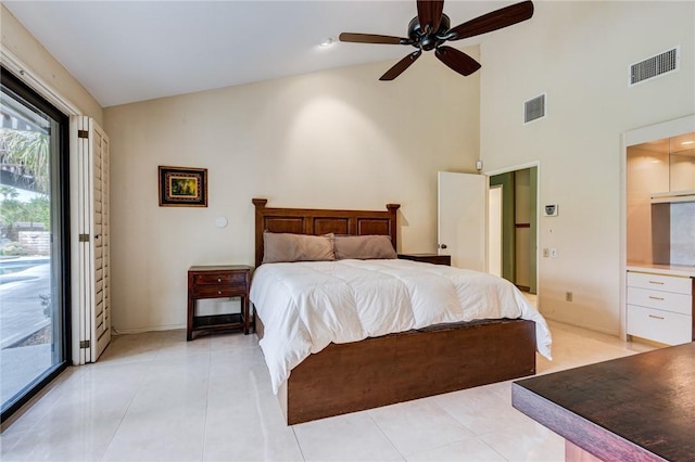 bedroom with light tile patterned floors, ceiling fan, access to exterior, and lofted ceiling