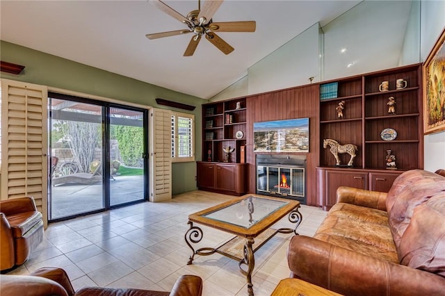 living room with ceiling fan, light tile patterned flooring, and high vaulted ceiling