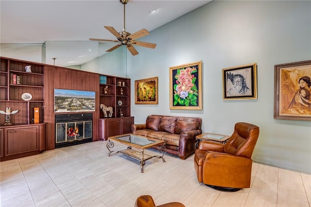 living room with ceiling fan, light tile patterned floors, and high vaulted ceiling