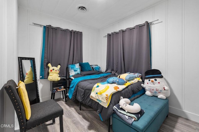 bedroom featuring hardwood / wood-style flooring