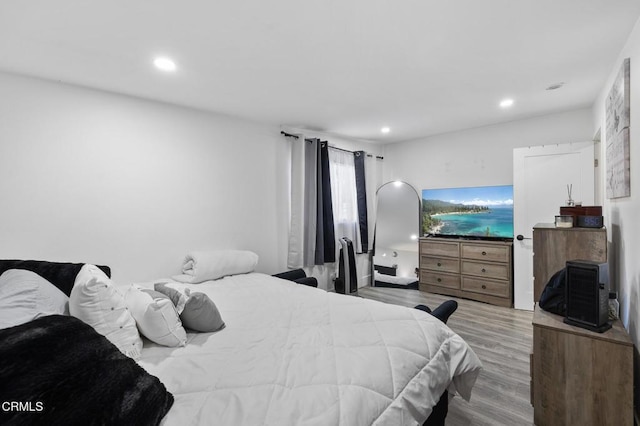 bedroom featuring light wood-type flooring