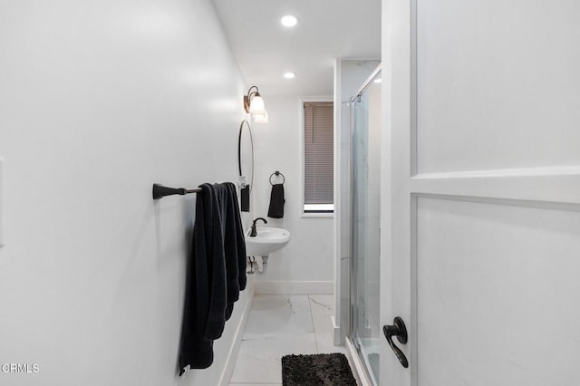 bathroom featuring sink and walk in shower