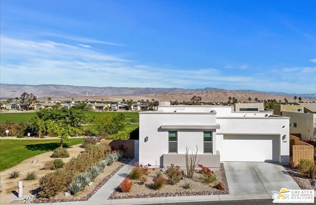 view of front of home with a mountain view