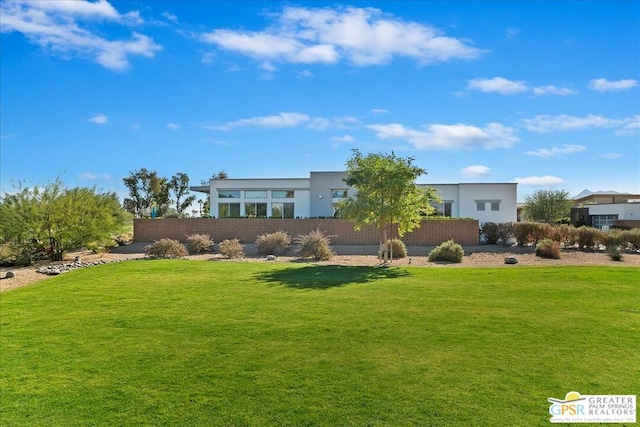 exterior space with a front yard