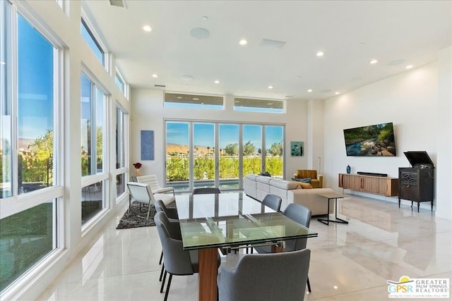 dining area with plenty of natural light