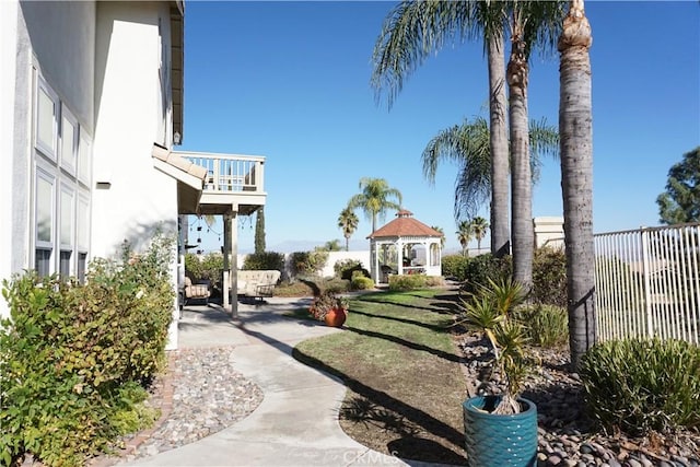 view of home's community with a gazebo and a patio